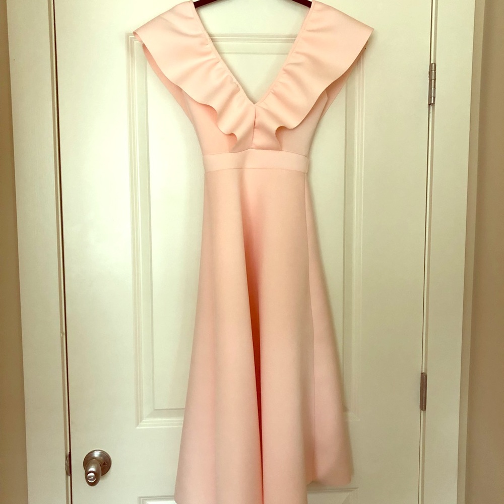 Light pink v-neck midi dress perfect for events